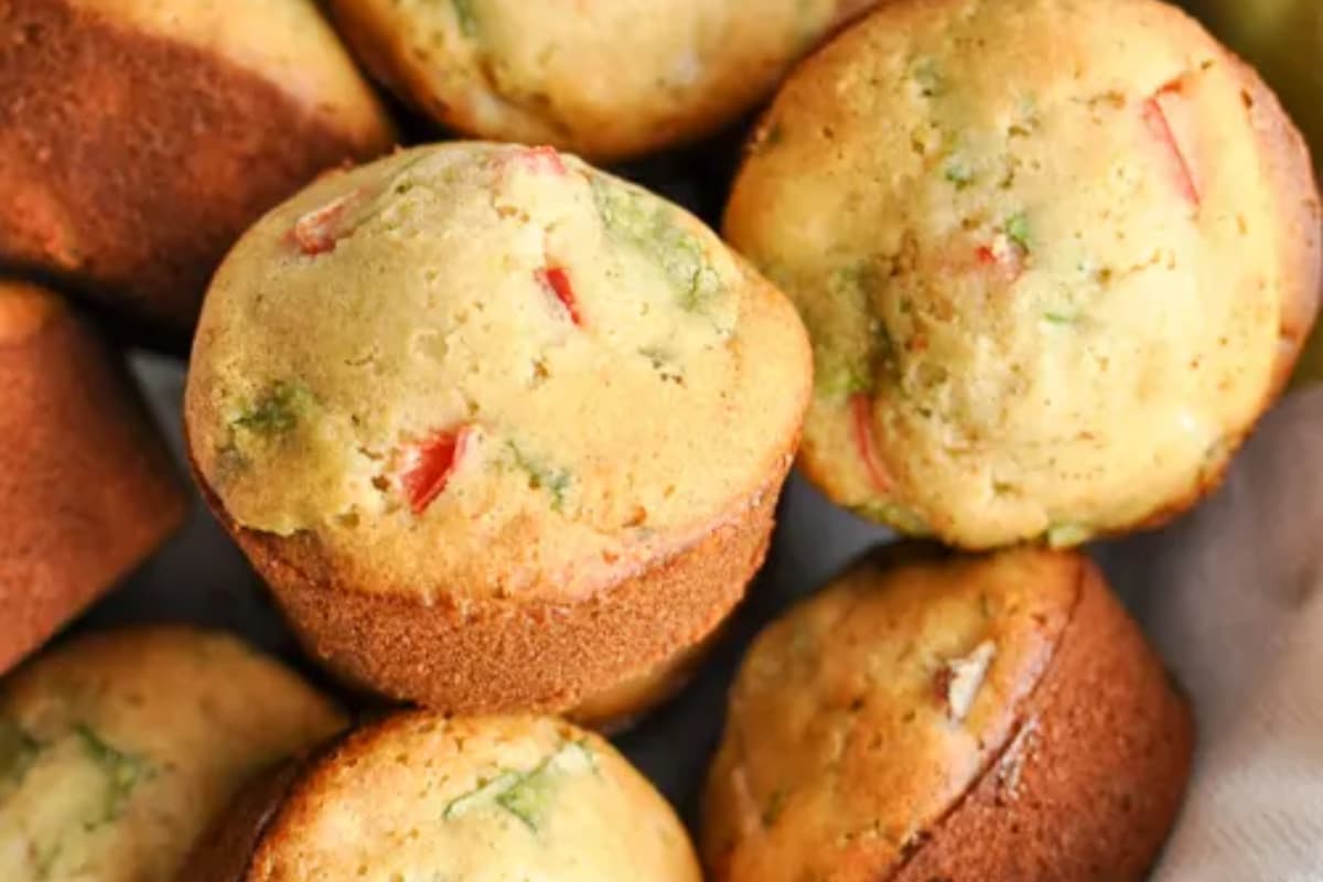 A dish of Gluten-Free Breakfast Muffins with Ham and Veggies.