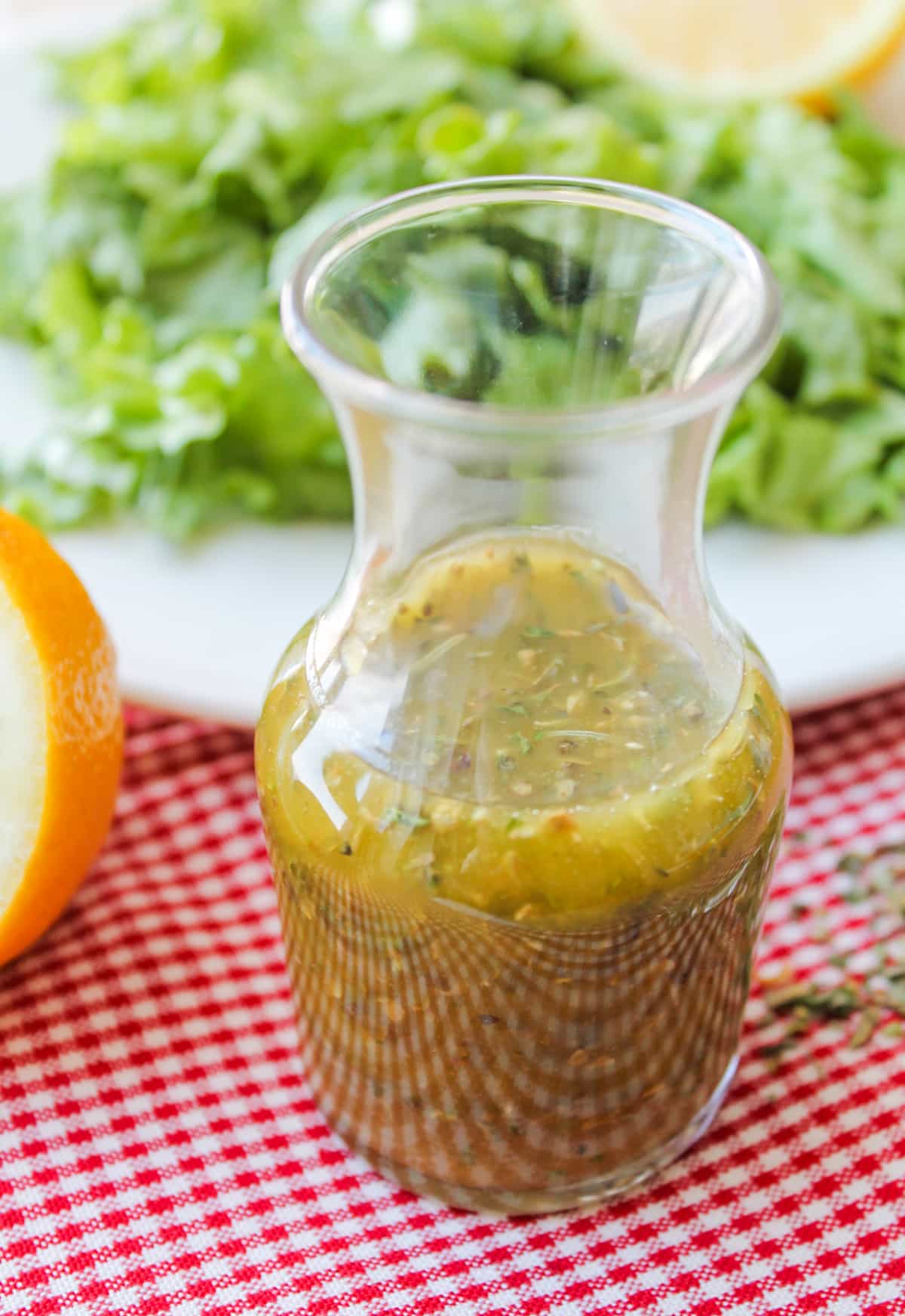A jar of homemade Italian dressing.