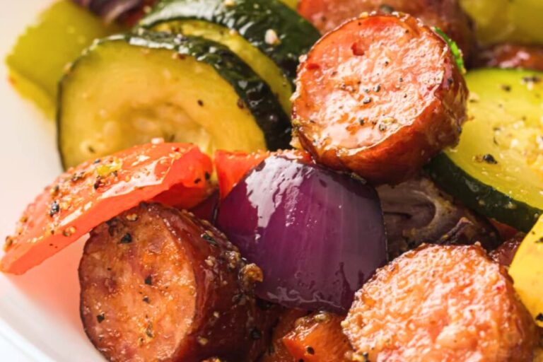 A plate of Sheet Pan Sausage and Vegetables.
