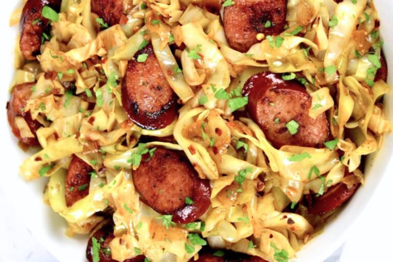 A plate of Skillet Fried Cabbage and Sausage.