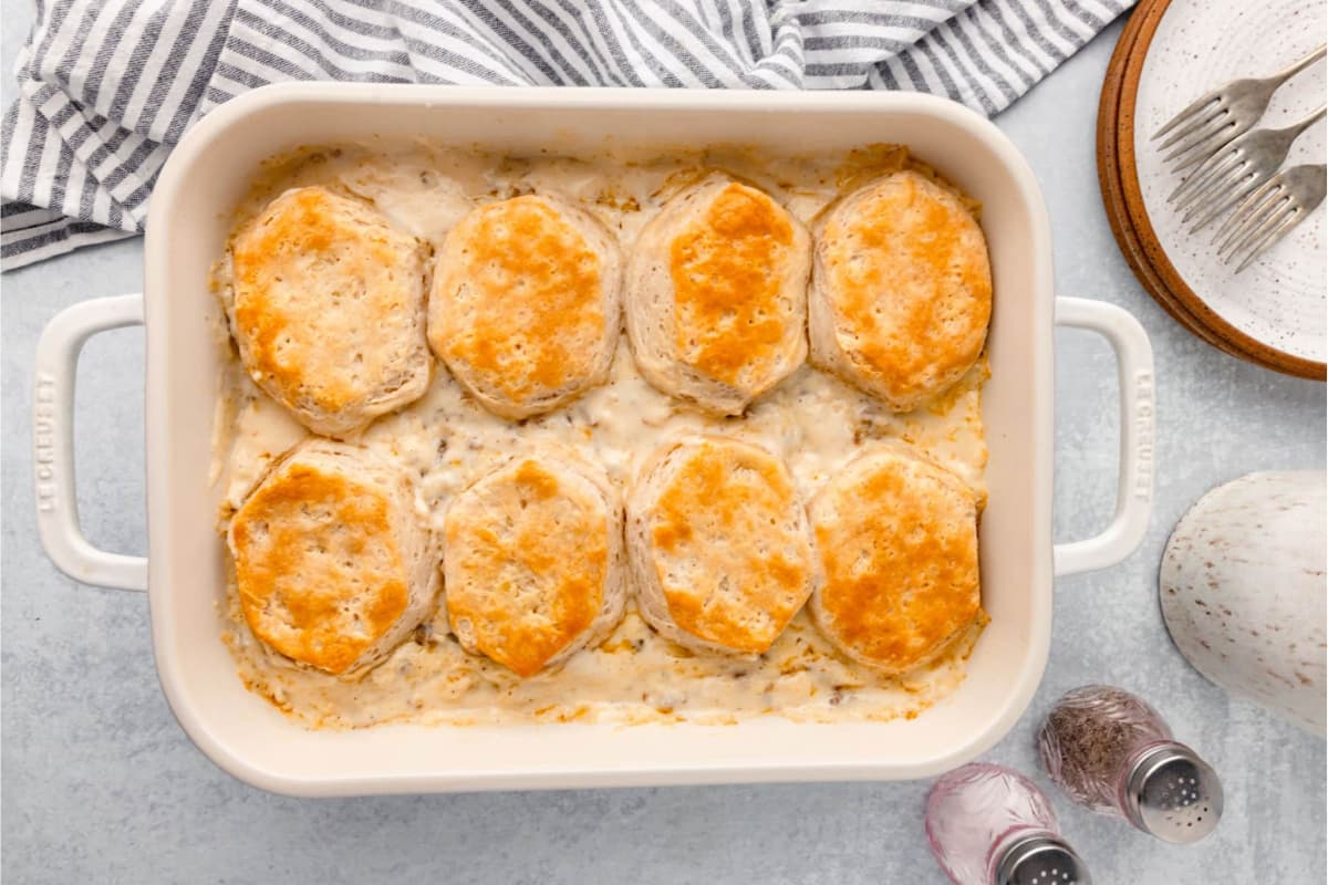 A dish of Sausage, Biscuits and Gravy Casserole.