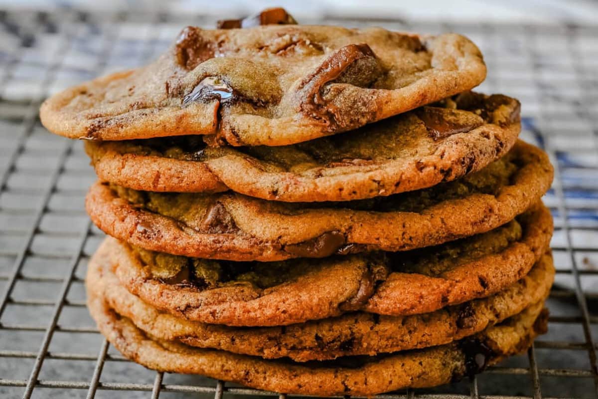 A dish of Thin and Chewy Chocolate Chip Cookies.