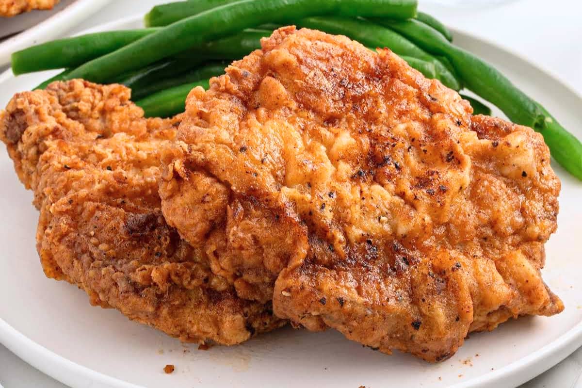 A plate of 20 Minute Pan Fried Pork Chops.