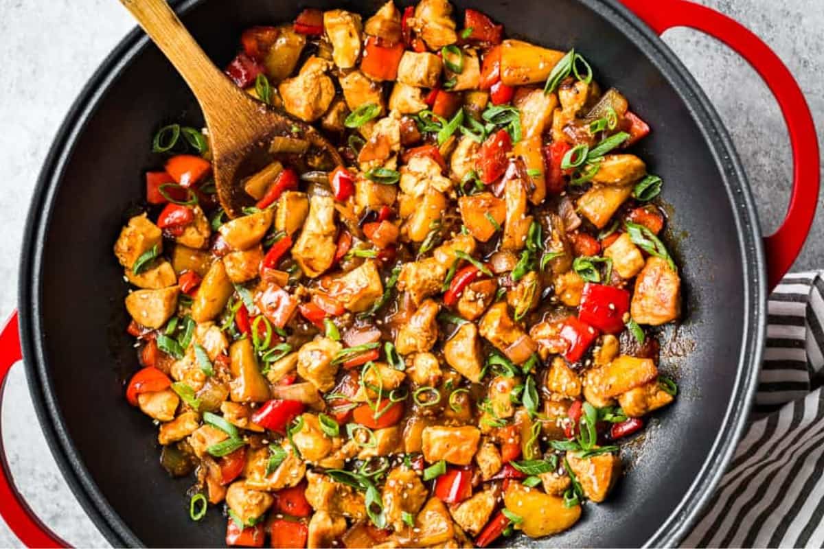 A dish of sweet and sour chicken stir fry.