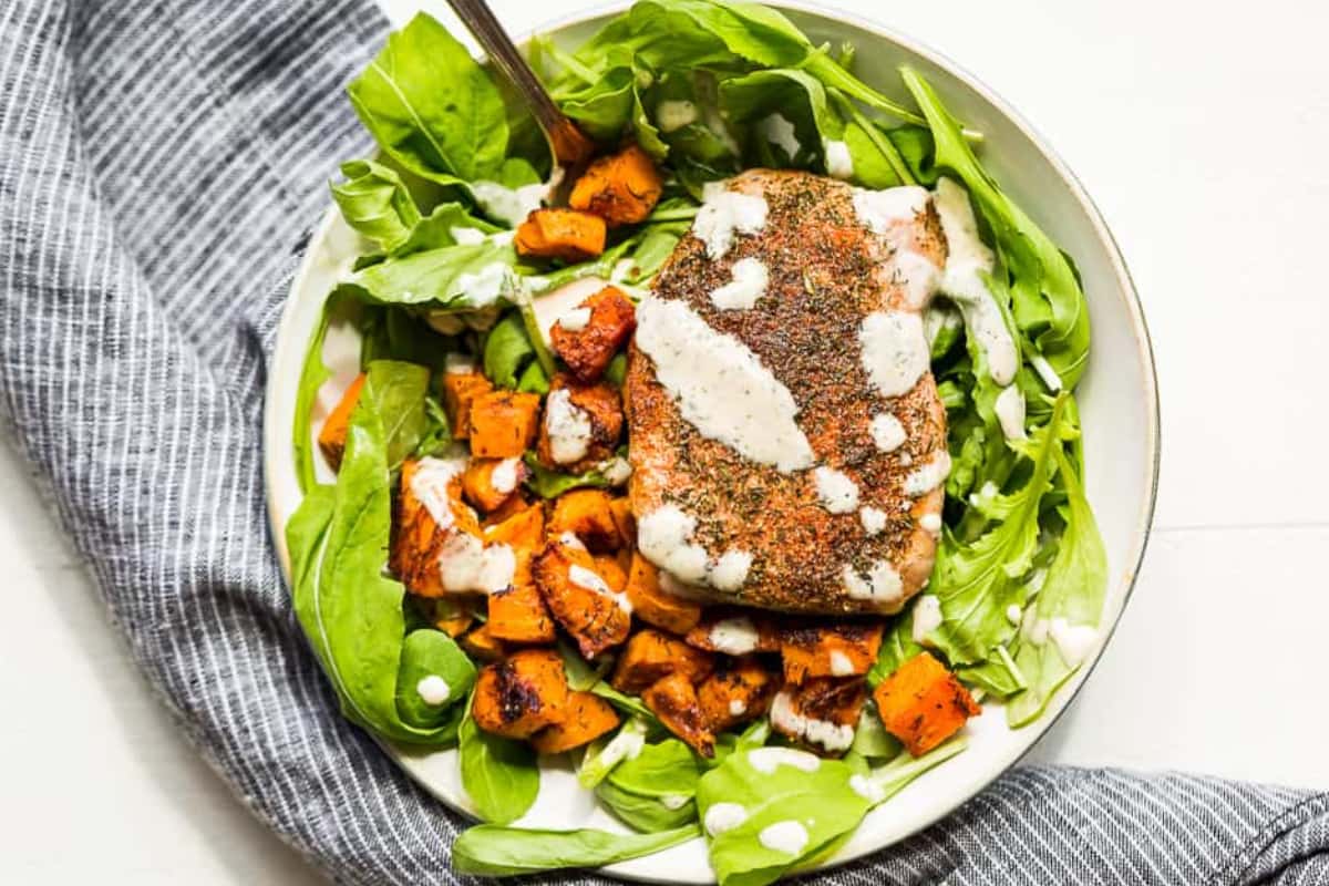 A bowl of Double Ranch Pork Chop Sheet Pan Dinner.