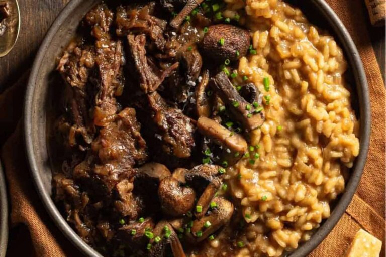 A plate of Braised Short Rib Risotto with Mushrooms.
