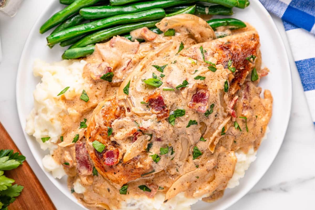 A dish of smothered chicken.