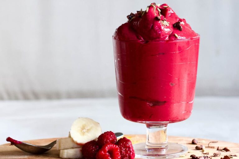 A dish of Banana, Raspberries and Beet Nice Cream.