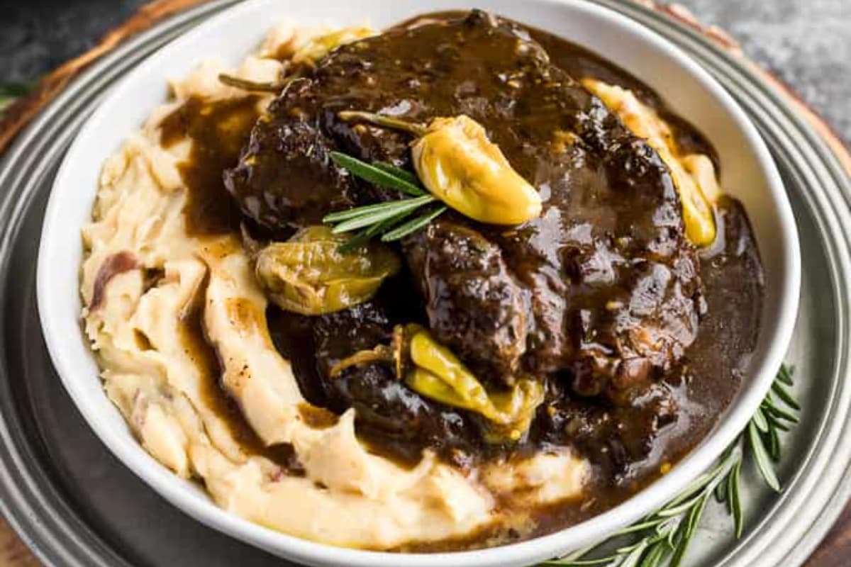 A dish of Instant Pot Balsamic Pepperoncini Pot Roast.
