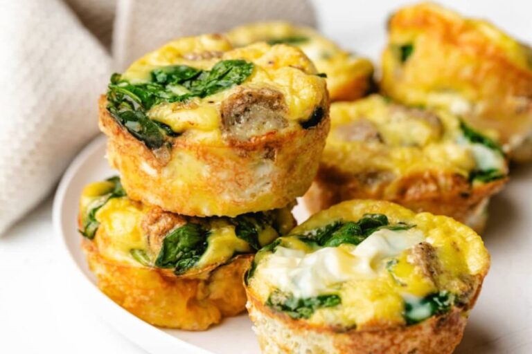 A plate of Spinach Sausage Egg Muffins.