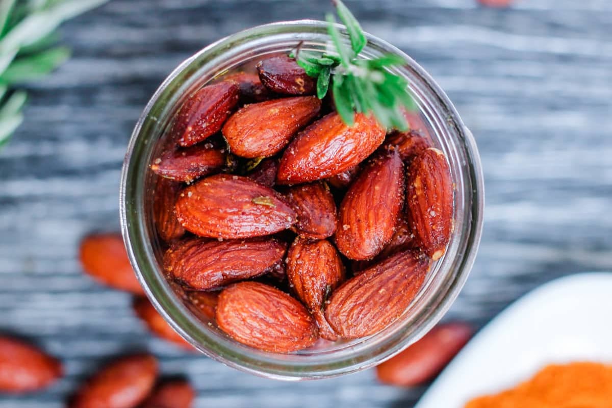 A jar of Oven Roasted Rosemary Almonds.