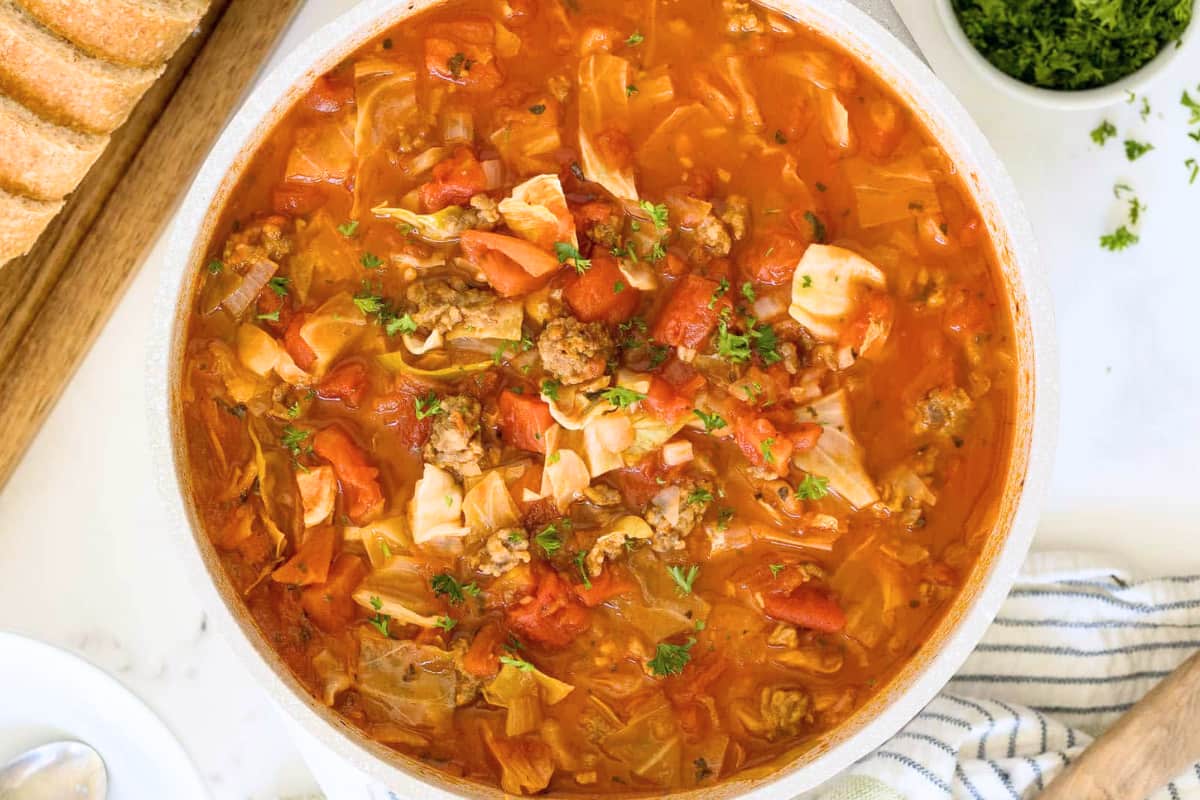 A bowl of Sausage & Cabbage Soup.
