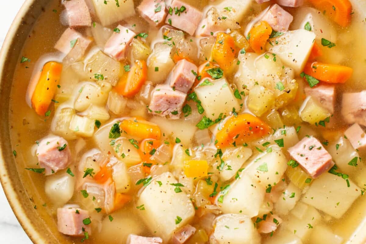 A bowl of Slow Cooker Ham and Potato Soup.