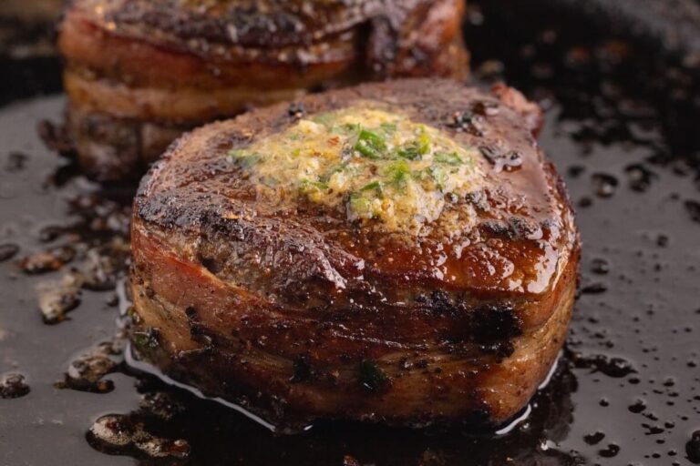 A pan of Bacon-Wrapped Filet Mignon with Cowboy Butter.
