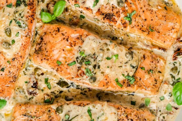 A plate of Creamy Sun-Dried Tomato Basil Salmon.