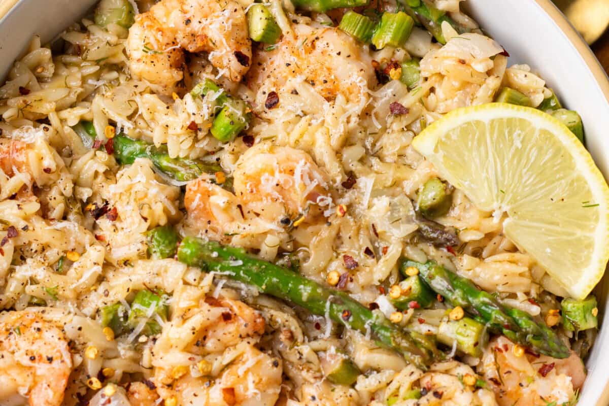 A dish of One Pot Lemon Butter Shrimp Orzo.