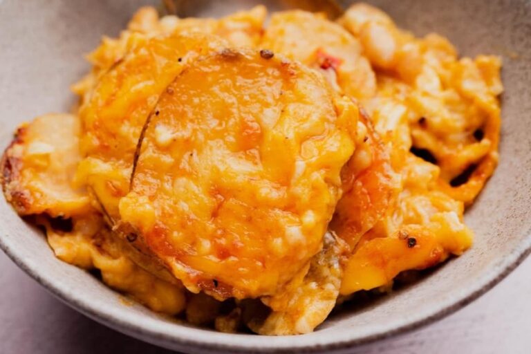 A dish of Cheesy Buffalo White Bean Potato Bake.