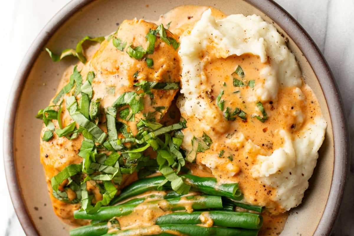 A plate of Baked Tomato Basil Chicken.