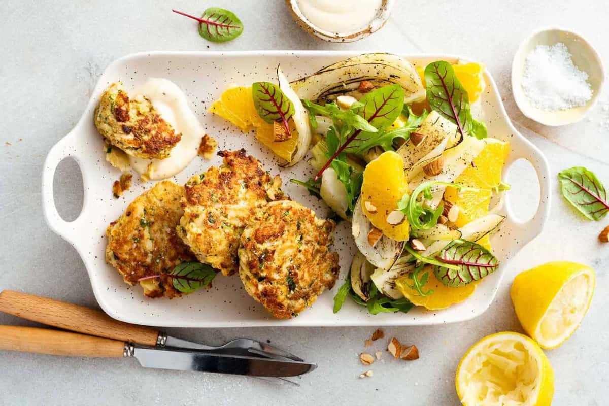 A dish of Citrus Fish Cakes with Fennel and Orange Salad.