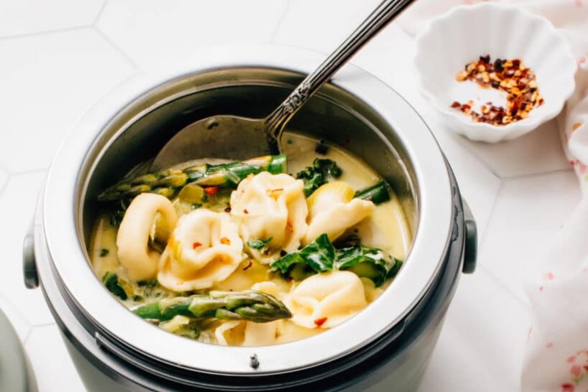 A bowl of Crockpot Tortellini Soup.