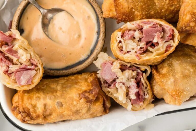 A dish of Reuben Egg rolls.