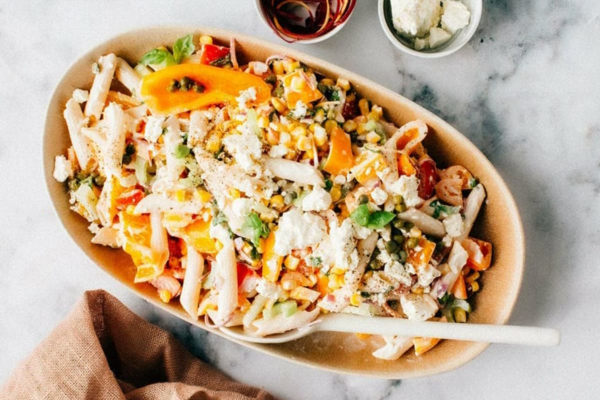 A dish of Healthy Greek Pasta Salad with Creamy Feta Dressing.