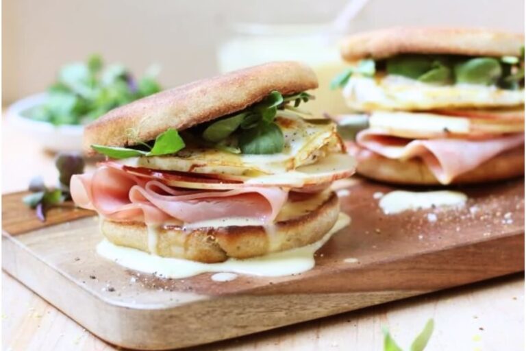 A plate of Egg, Ham, and Apple Breakfast Sandwich.