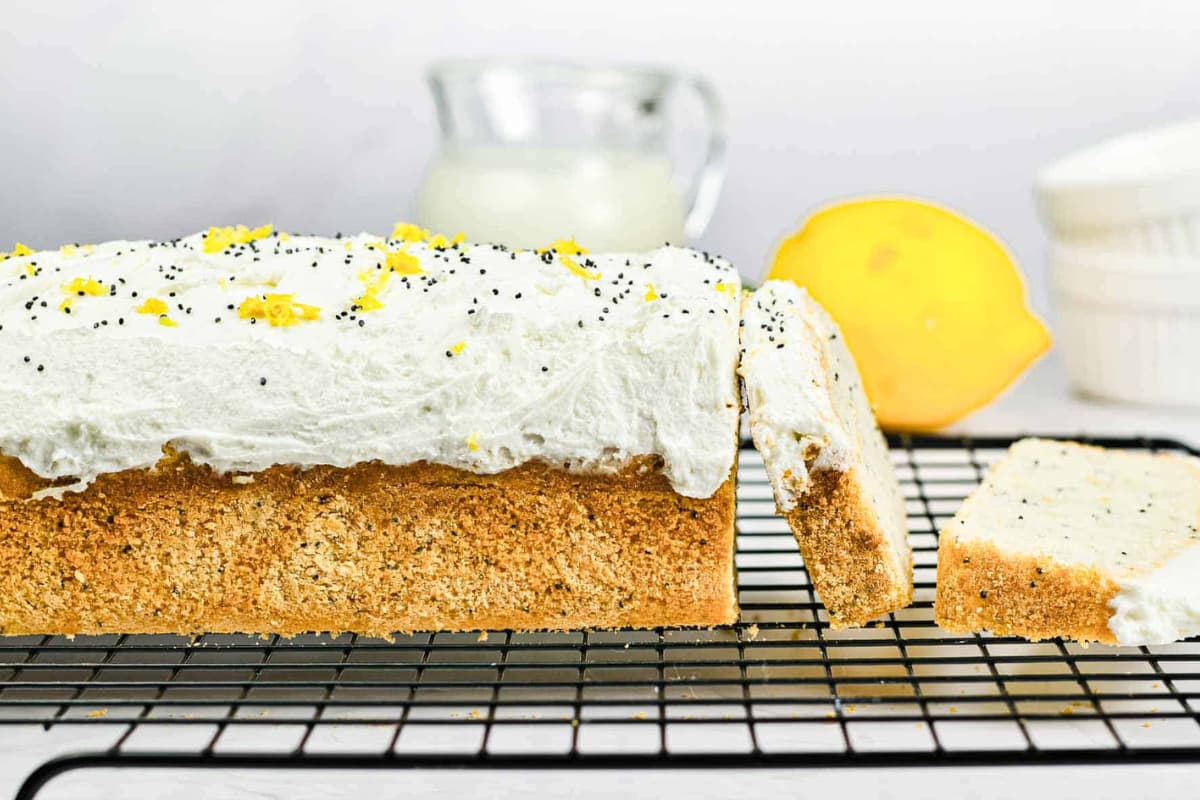 A tray of Gluten-Free Lemon Poppy Seed Loaf Cake.