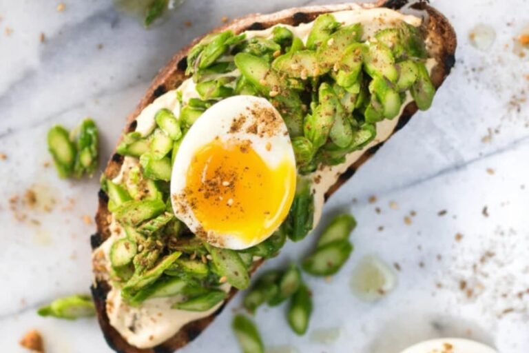 A plate of Soft-Boiled Egg and Fresh Asparagus Tartine.
