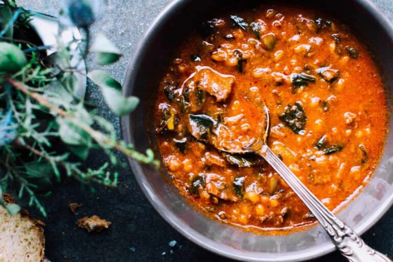 A bowl of Instant Pot Beef Barley Soup.