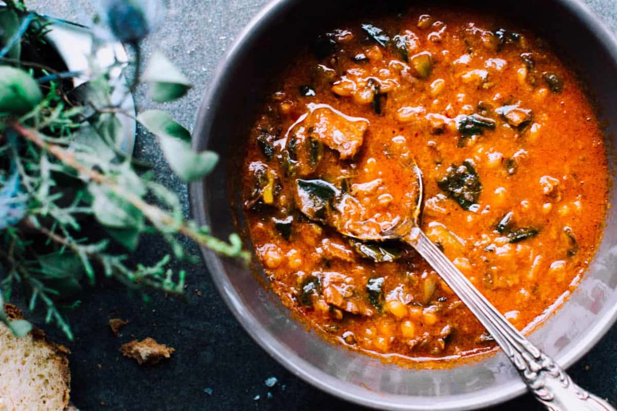 A bowl of Instant Pot Beef Barley Soup.