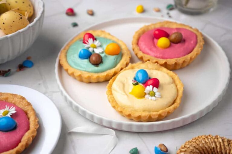 A plate of Mini Spring Cheesecake Tarts.