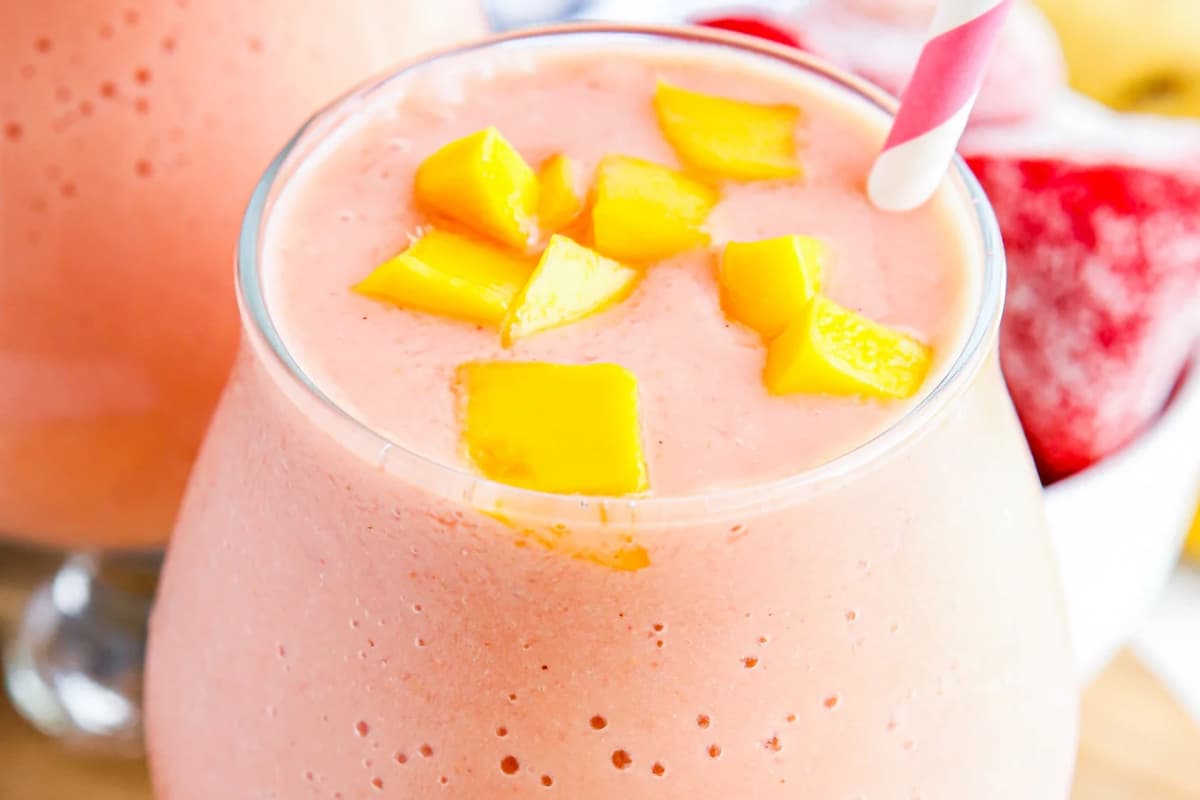 A glass of Strawberry Mango Smoothie.