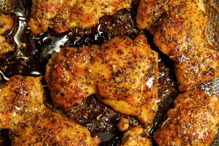 A dish of Juicy Cajun Butter Chicken Thighs.