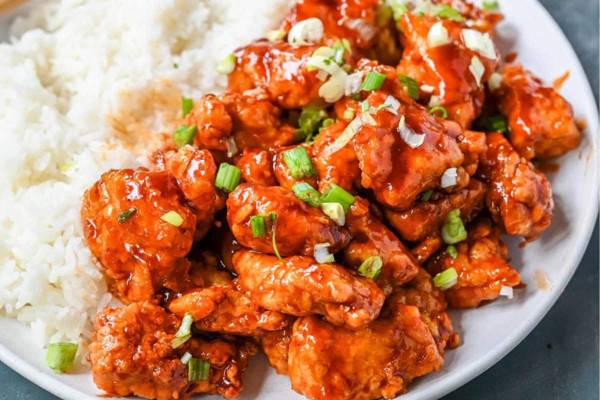 A plate of Crispy Honey Sriracha Chicken.
