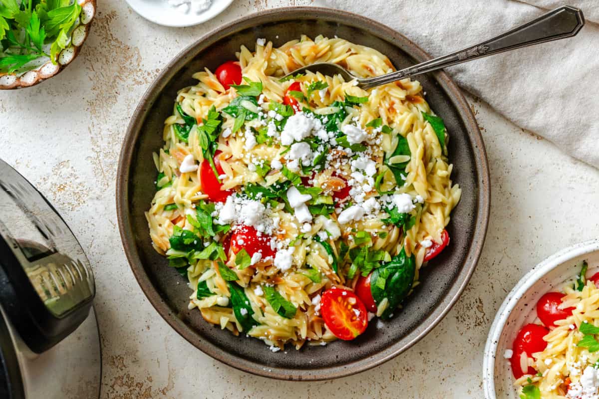 A dish of Instant Pot Garlic Feta Orzo.
