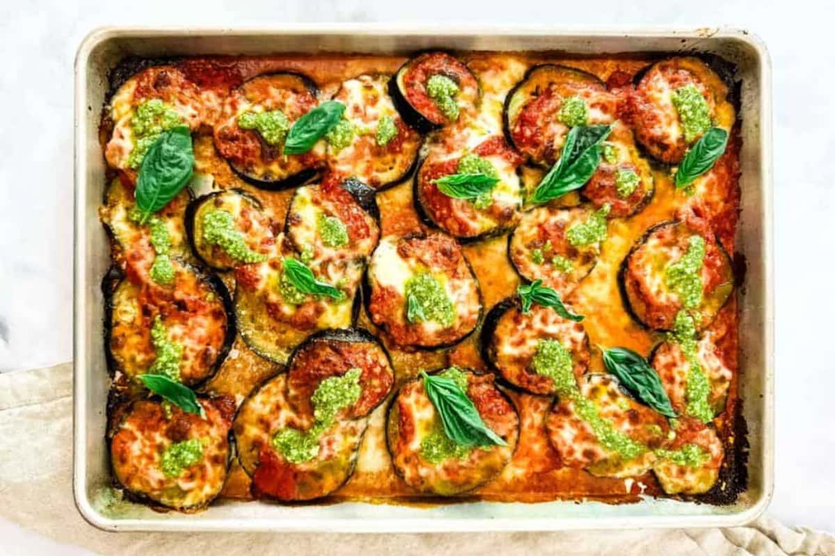 A dish of Easy Weeknight Sheet Pan Eggplant Parmesan.