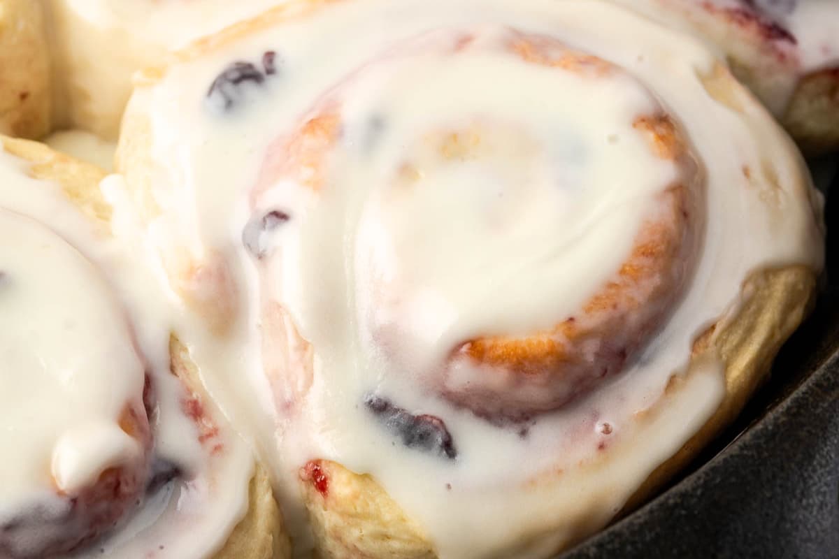 A dish of Sweet and Buttery Cherry Rolls.