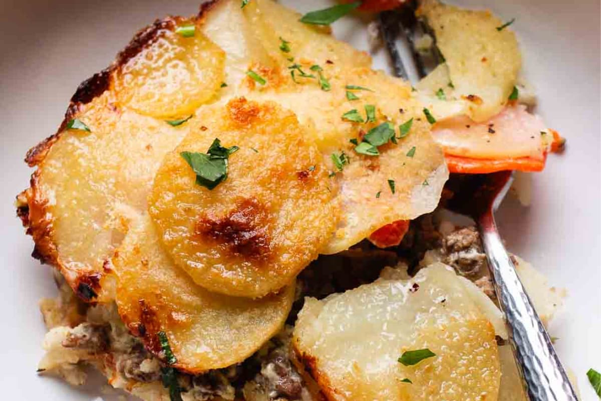 A plate of Potato and Carrot Casserole with Ground Beef.