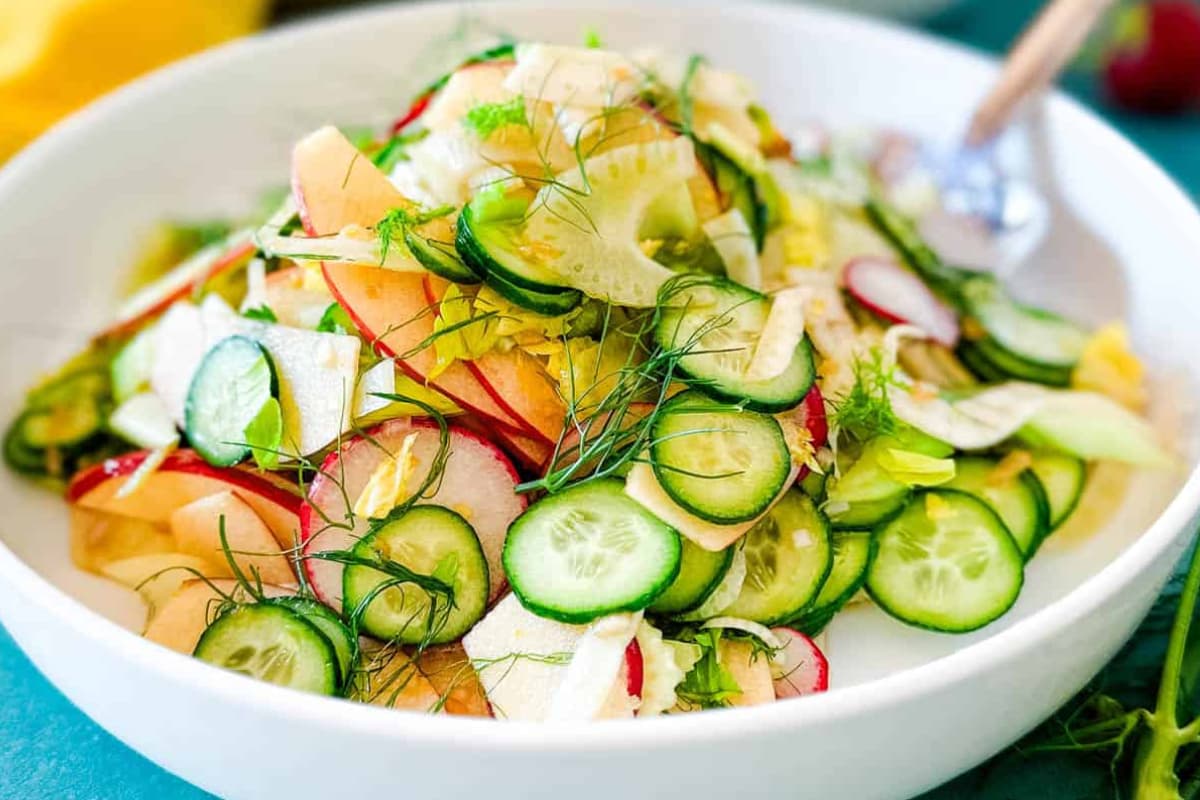 A bowl of Apple Cucumber Salad with Ponzu Soy Vinaigrette.