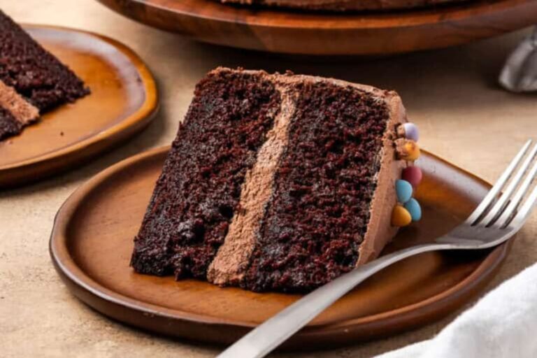 A plate of Chocolate Cake with Chocolate Frosting.
