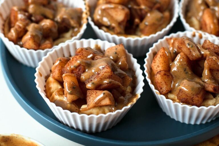 A dish of Mini Apple Pie Cheesecakes.