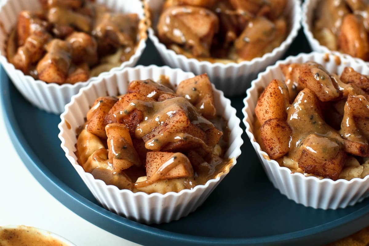 A dish of Mini Apple Pie Cheesecakes.