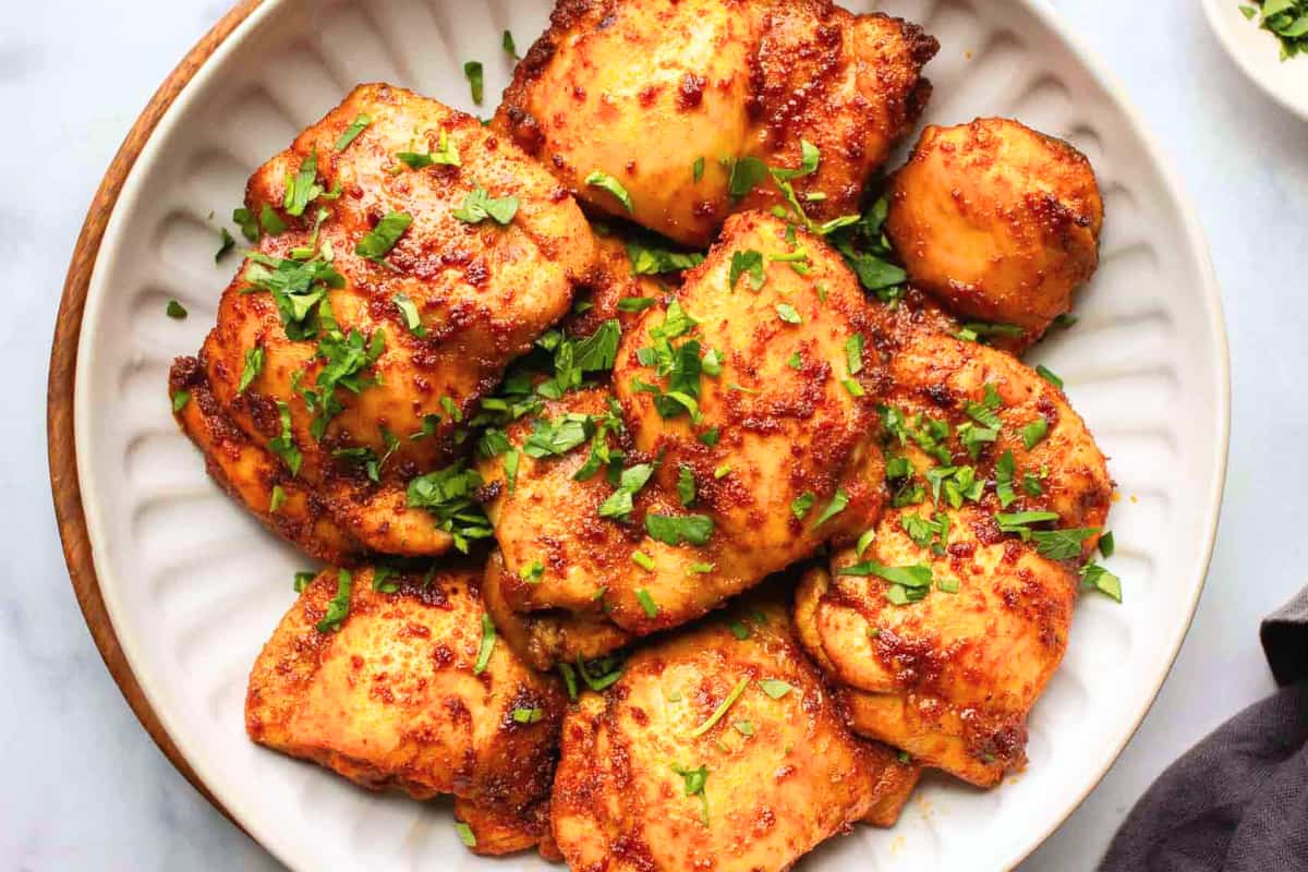 A plate of Oven Baked Chicken Thighs.