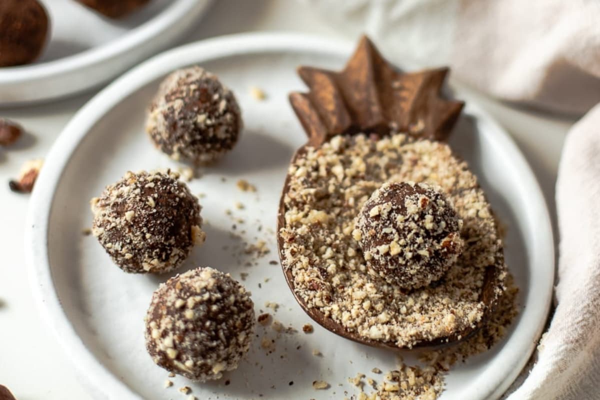 A plate of Chocolate Hazelnut Almond Pulp Energy Balls.