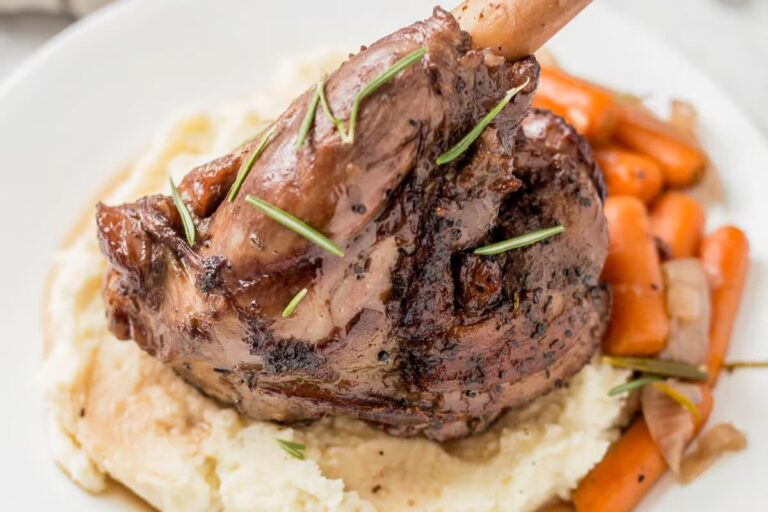 A plate of Braised Lamb Shanks.