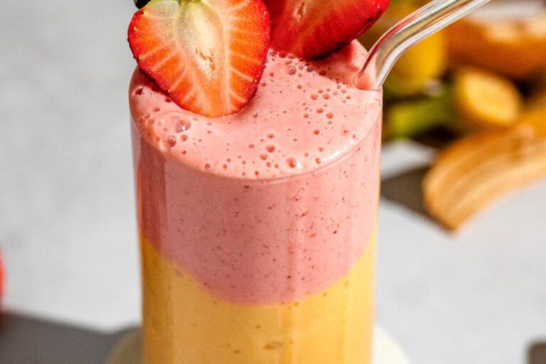A glass of Mango Strawberry Greek Yogurt Smoothie.