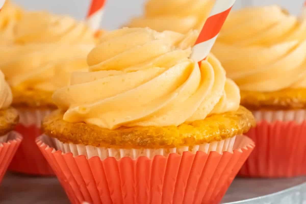 A plate of Orange Soda Cupcakes.