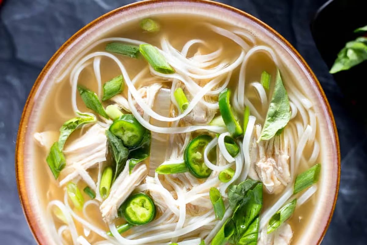 A bowl of slow cooker chicken pho soup.