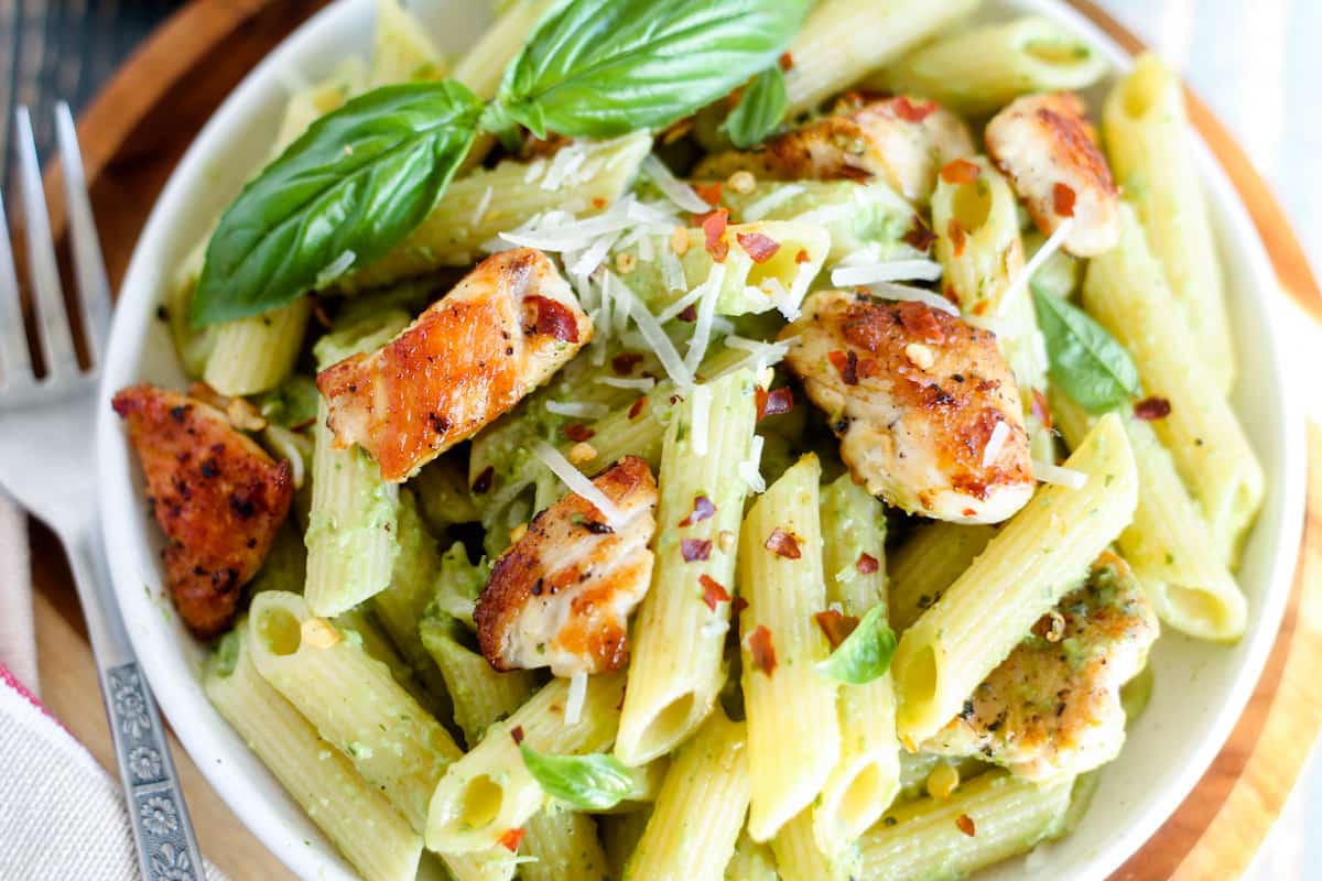 A plate of spicy basil chicken pasta.